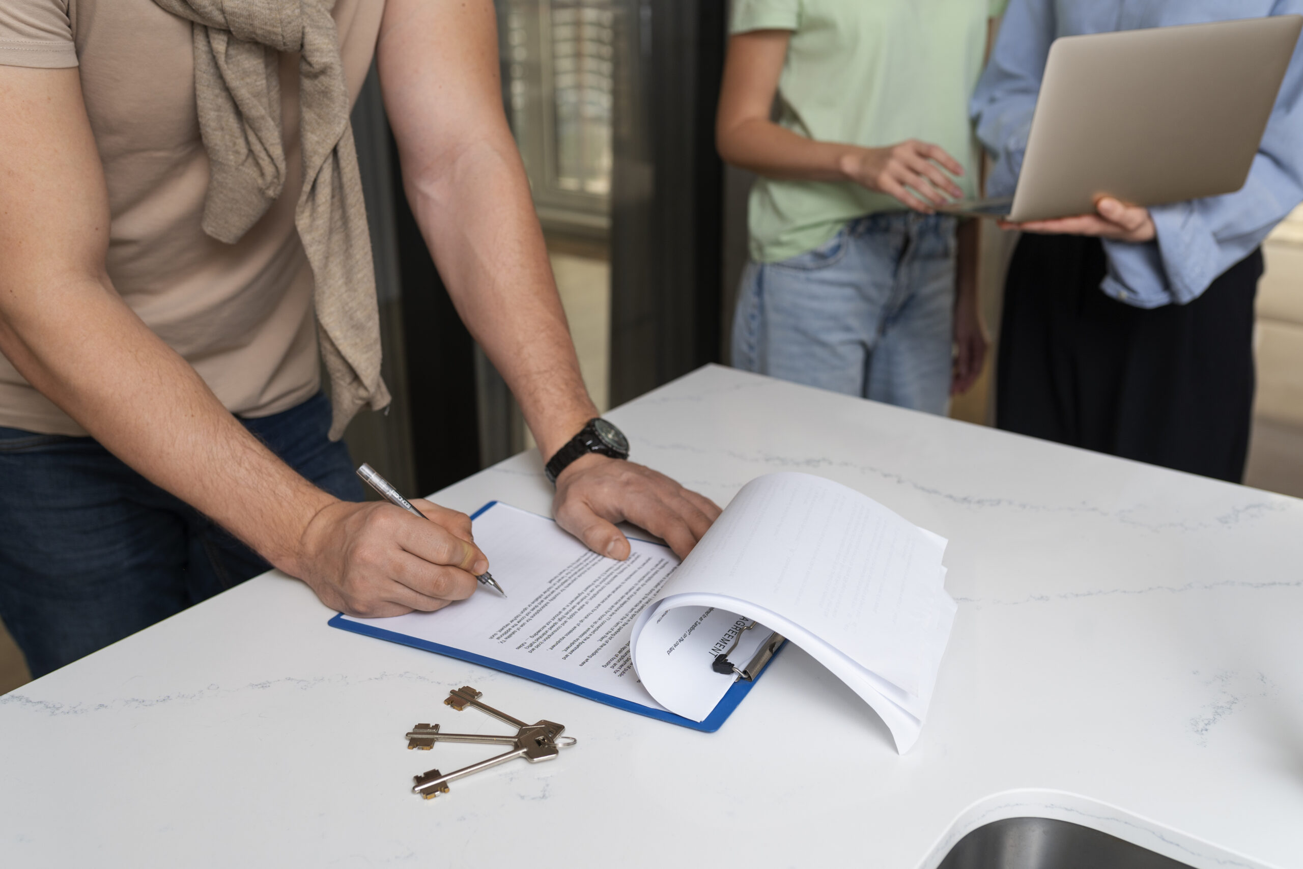 side view buyer signing document scaled